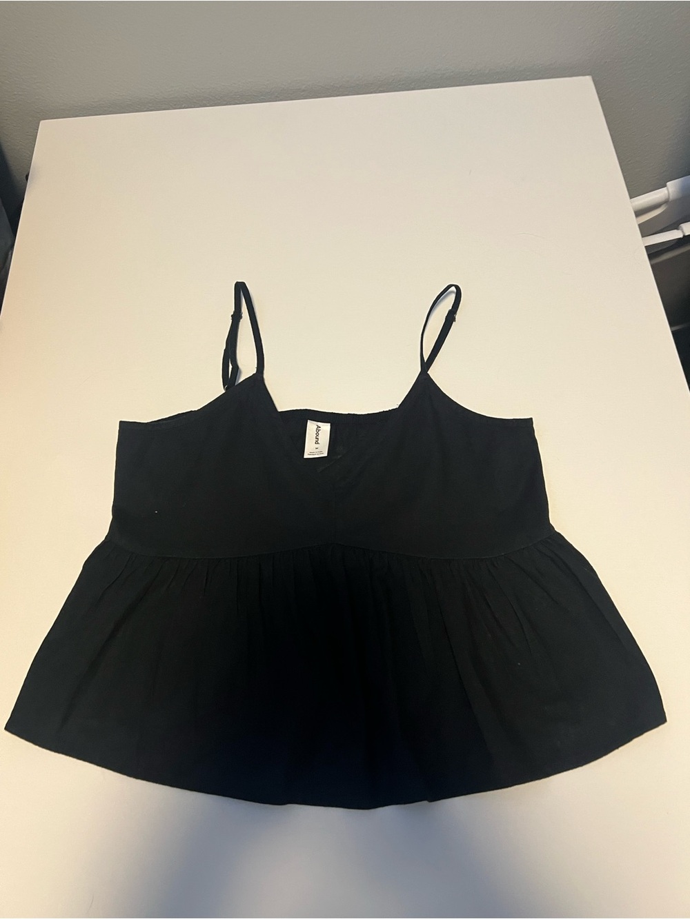 Abound Black Spaghetti Strap Peplum Camisole